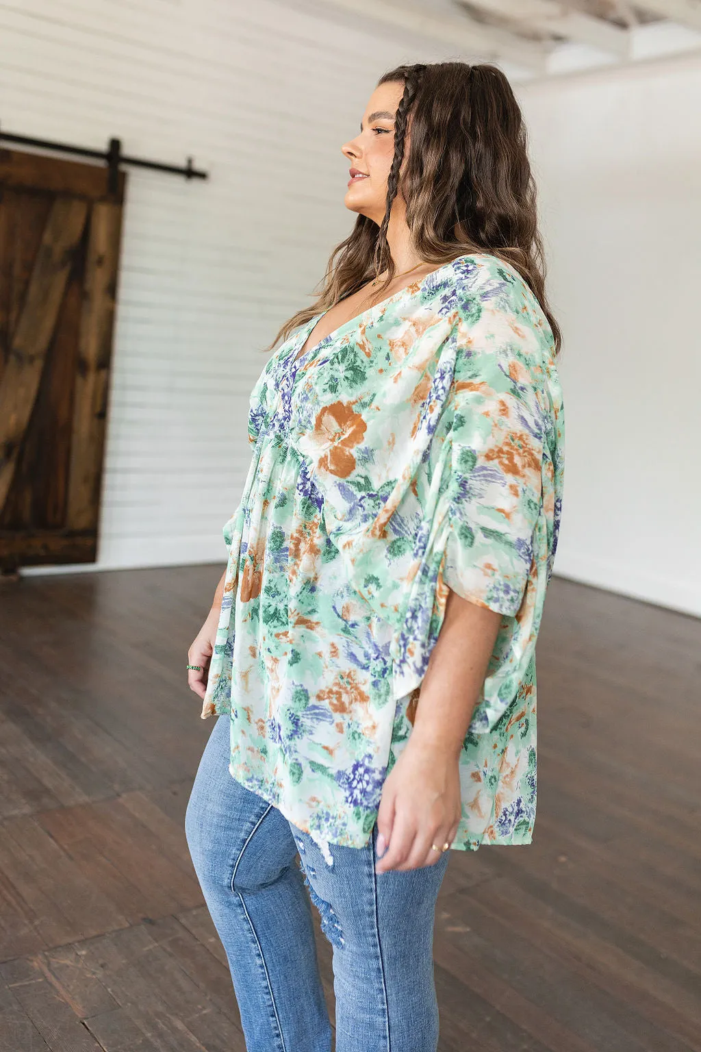 Fabled in Floral Draped Peplum Top