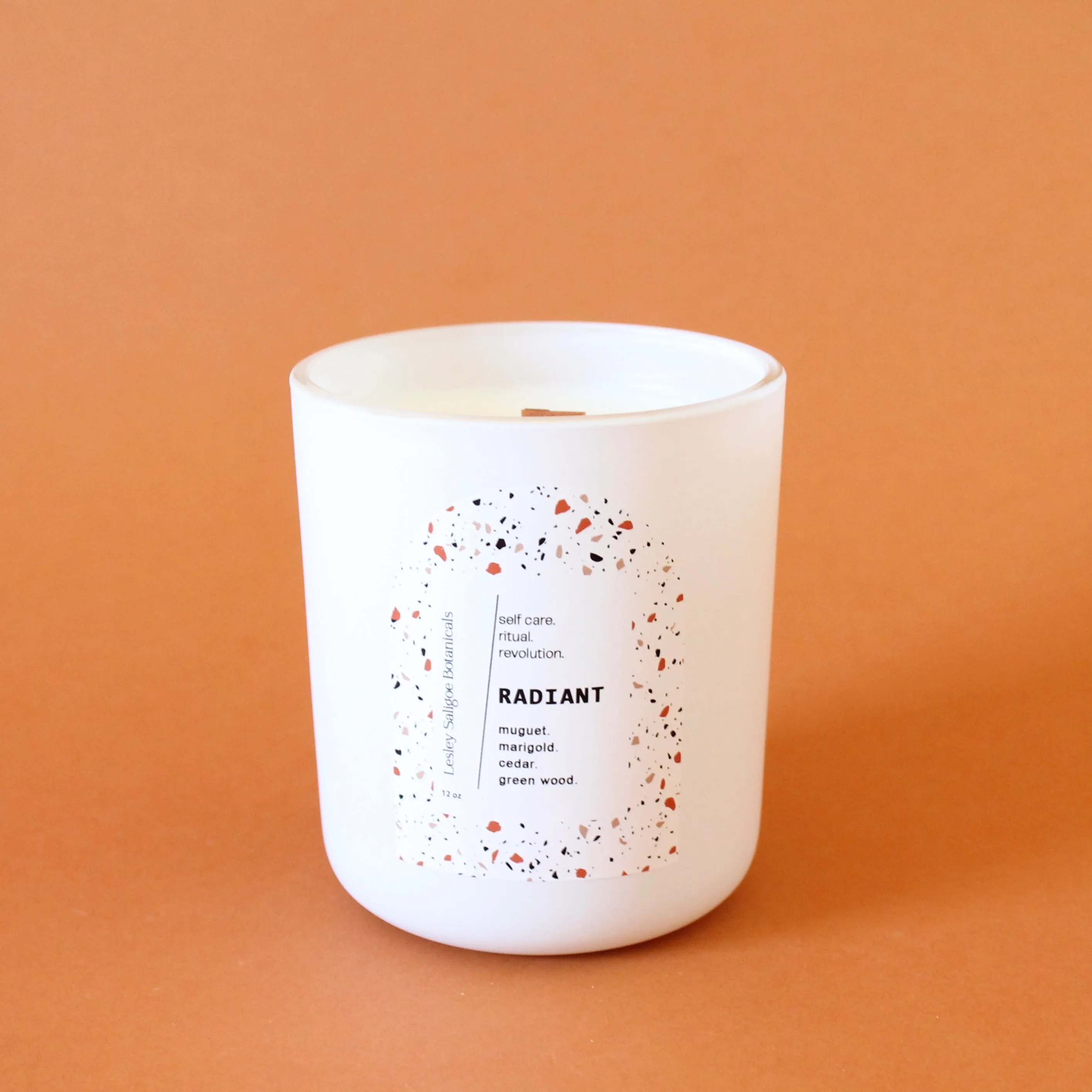 RADIANT Hand Poured Candle. Muguet. Cassis. Cedar. Marigold. Green Wood. Wood Wick. 12 oz. Matte White.