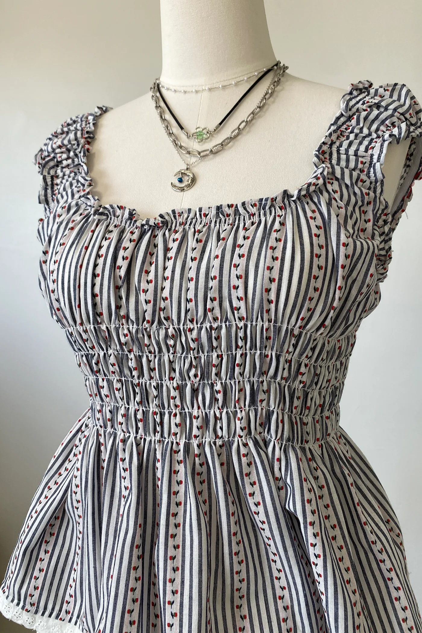 Sleeveless Floral Babydoll Top by For Good