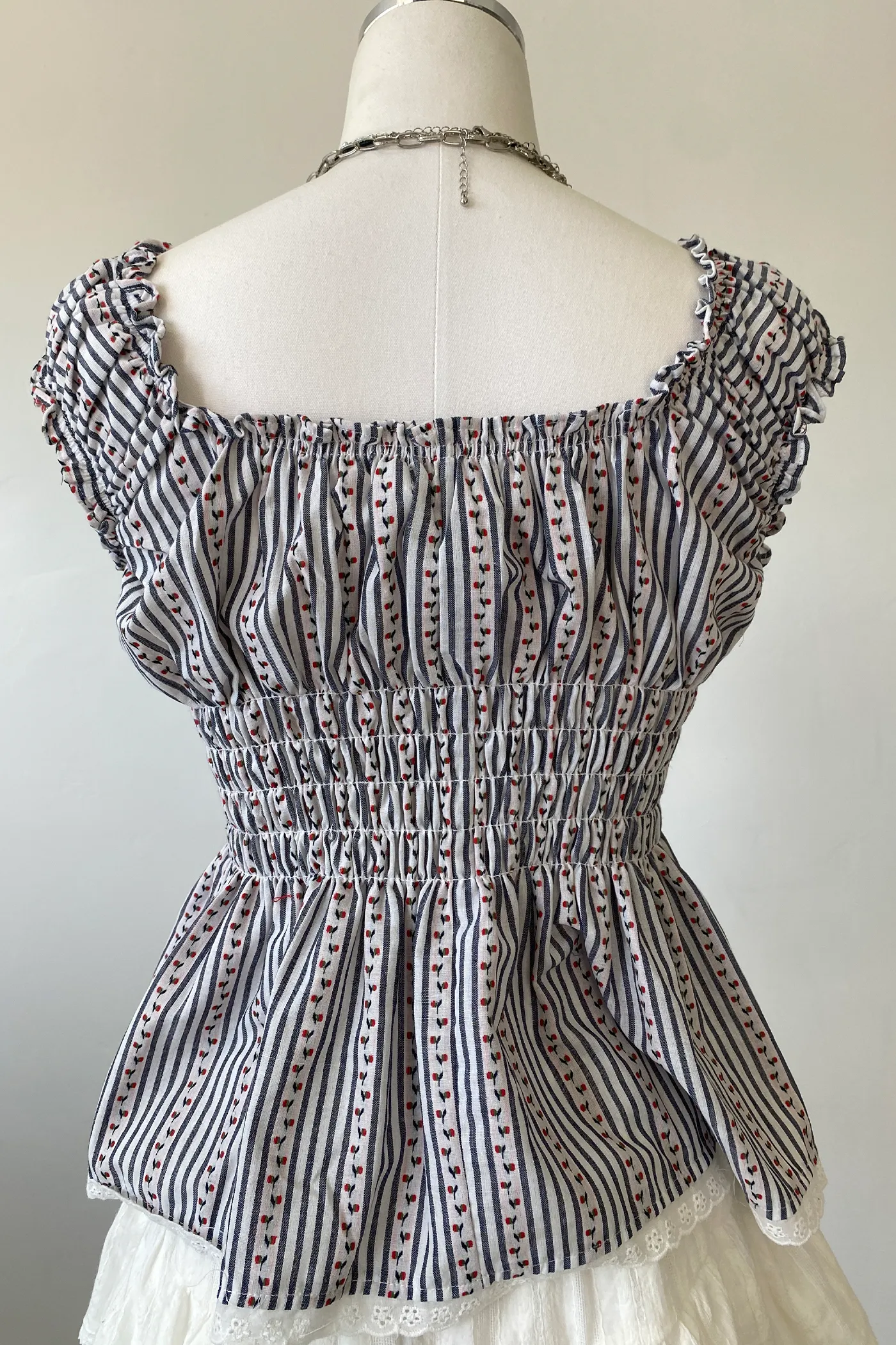 Sleeveless Floral Babydoll Top by For Good