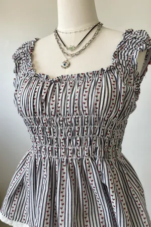 Sleeveless Floral Babydoll Top by For Good
