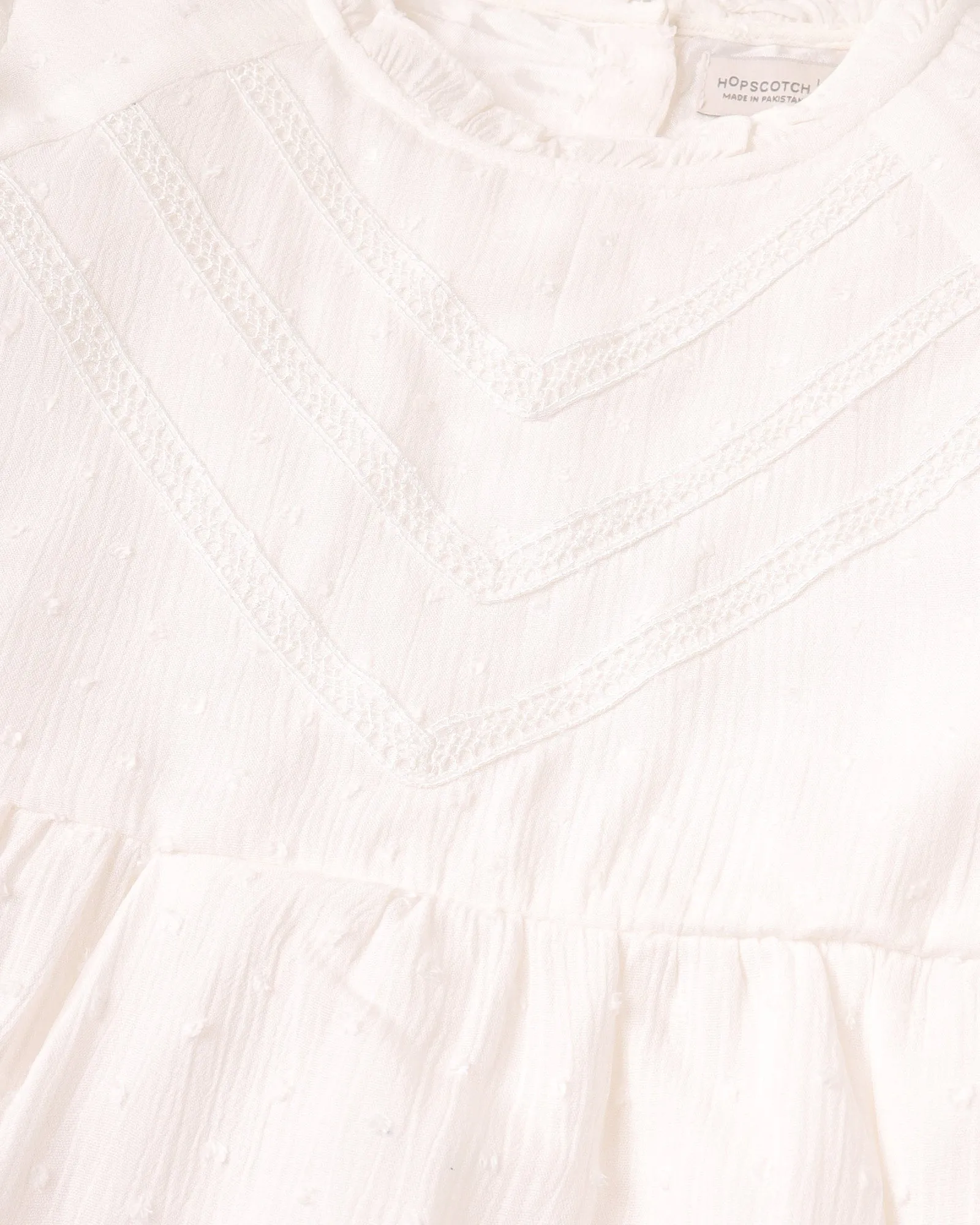 White Peplum Top