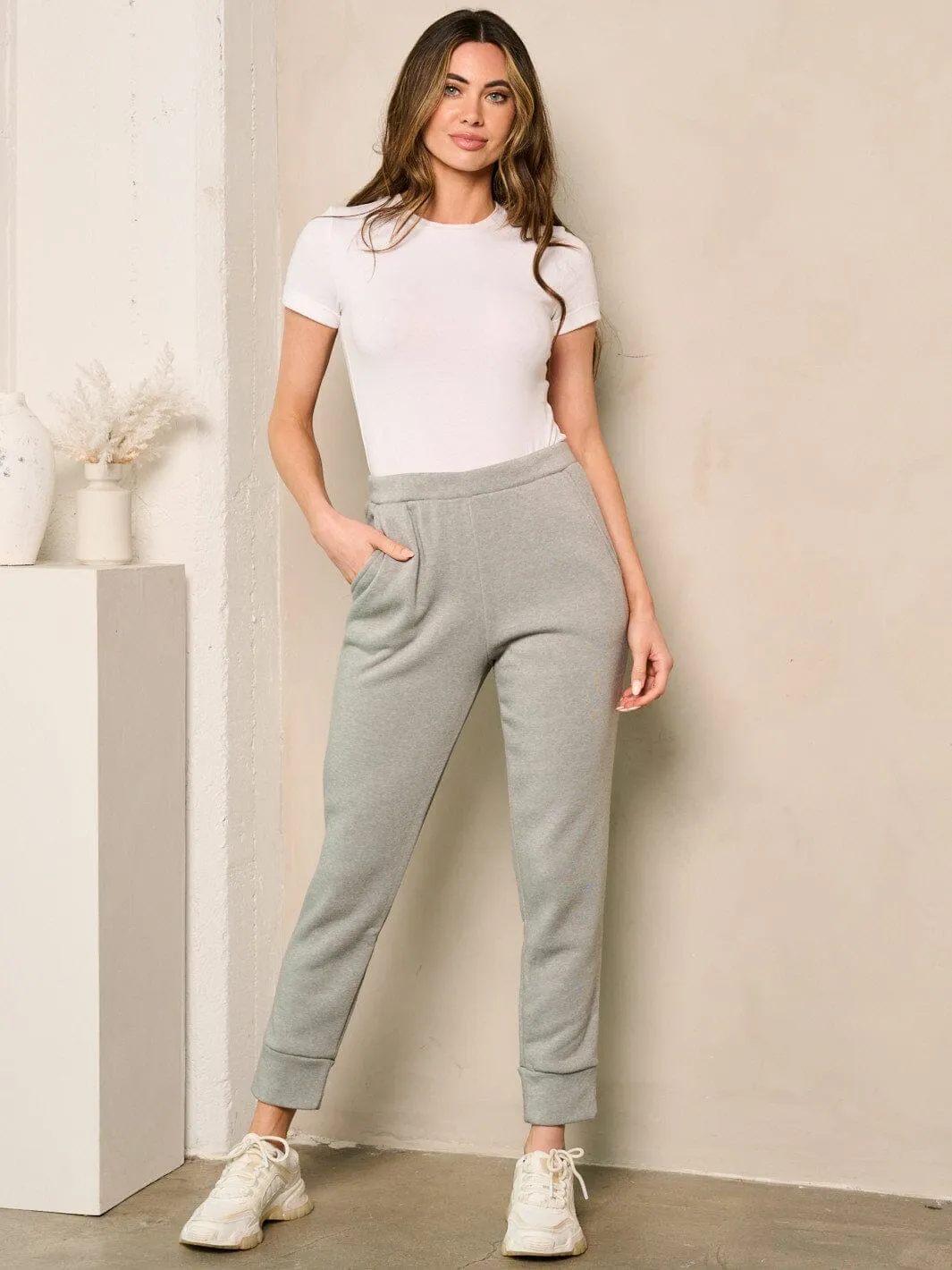 WOMEN'S ELASTIC WAIST SOLID POCKETS FLEECE PANTS